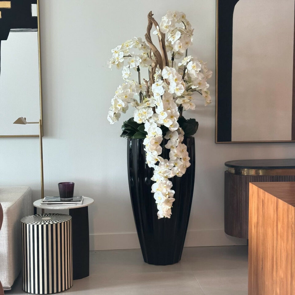 San Jose Vase in glossy black with hanging yellow orchids – The Ever Botanic
